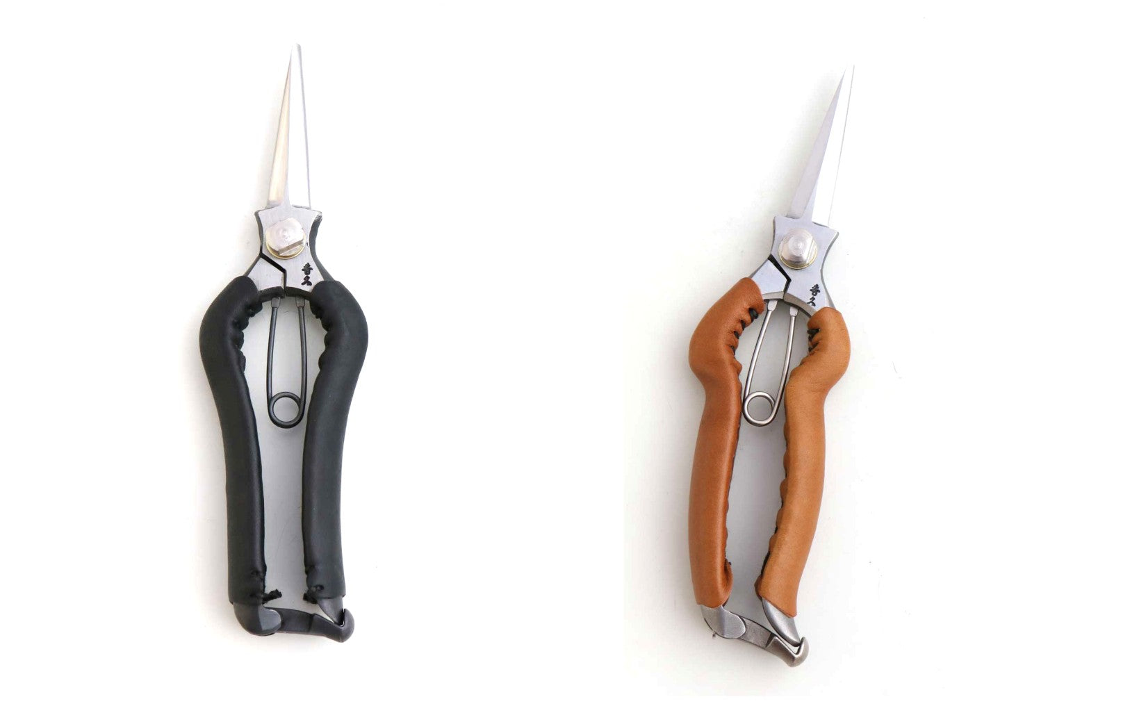Two pairs of garden shears with black and brown handles on a white background
